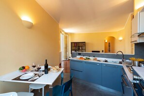 Family Apartment, Multiple Bedrooms (Lovely Apartment Via Nizza) | Private kitchen | Fridge, microwave, oven, stovetop - Lovely Apartment Via Nizza (Genoa)