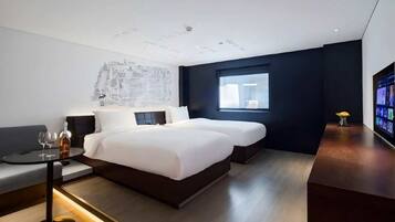 Cubrecamas, cortinas blackout y sistema de insonorización