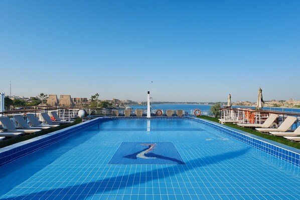 Outdoor pool, pool umbrellas, pool loungers