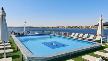 Outdoor pool, pool umbrellas, pool loungers