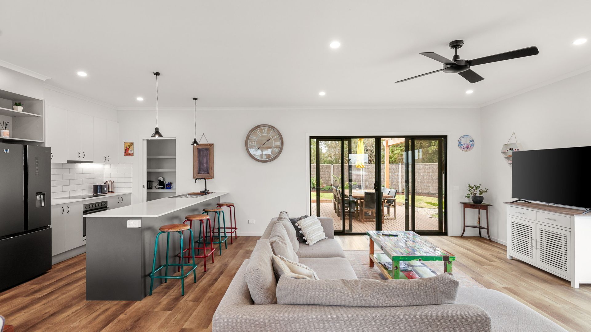 TV, fireplace, books