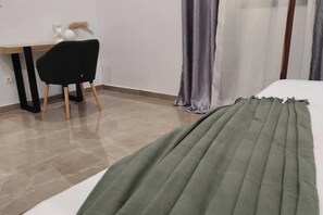 2 bedrooms, desk, iron/ironing board, travel crib