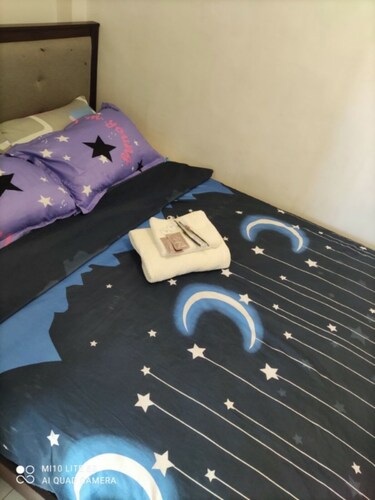 Room for Traveler'sCharming 1-bedroom apartment in fantastic Quezon City with AC