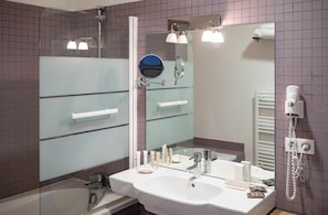Deluxe Double Room | Bathroom | Hair dryer, slippers, towels, soap
