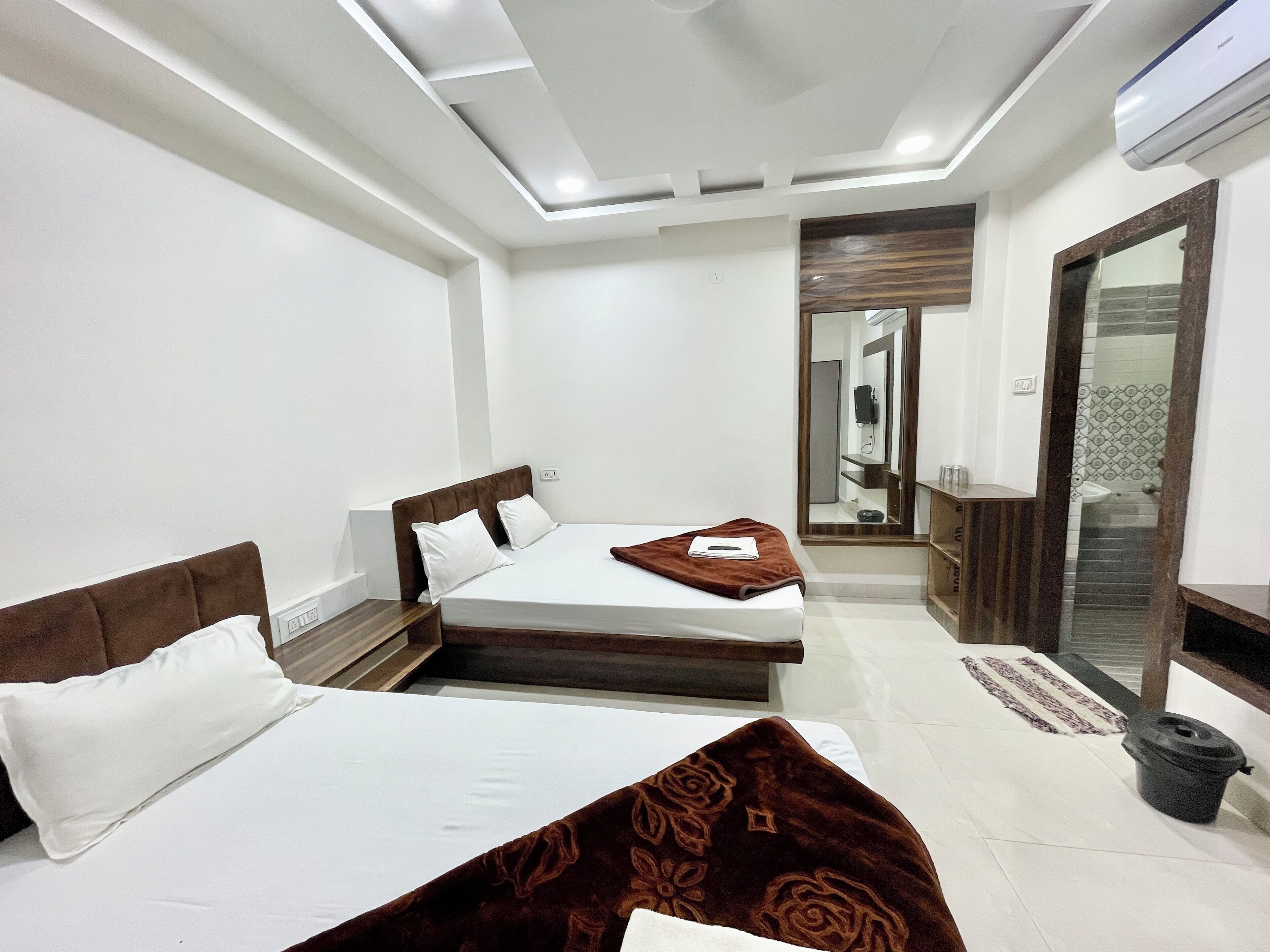 Premium bedding, desk, laptop workspace, soundproofing