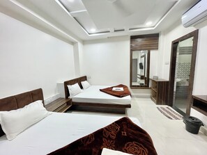 Premium bedding, desk, laptop workspace, soundproofing