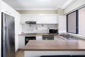 Family Apartment, Patio, Ground Floor | Private kitchen