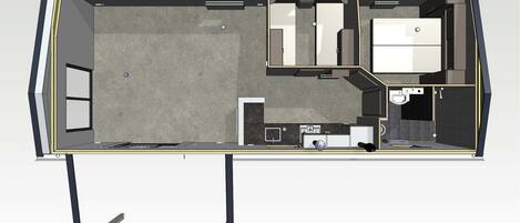 Een plattegrond van een hotelkamer met een bed, een bureau, een stoel, een kleine kitchenette en een badkamer.