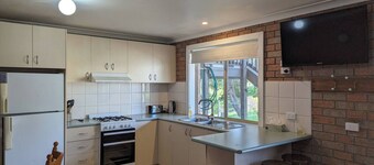 Stylish self-contained apartment in a tranquil garden setting.