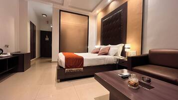 Deluxe Double Room, Balcony, Pool View | Minibar, in-room safe, desk, free WiFi