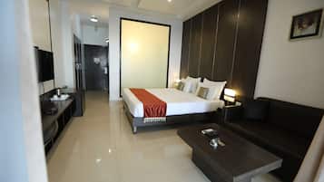 Deluxe Double Room, Balcony, Pool View | Minibar, in-room safe, desk, free WiFi
