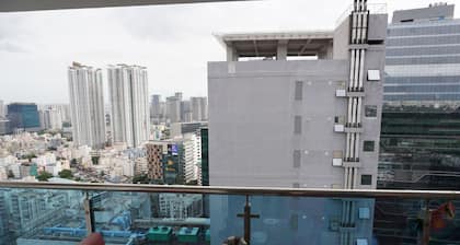 Sky Loft – Soar Above the City in Comfort, Surrounded by Skyline and Greenery.