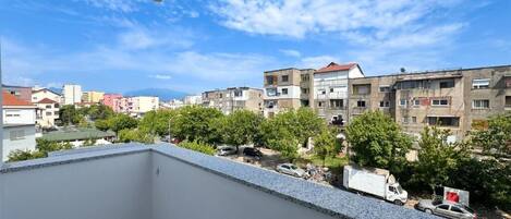Departamento Confort, balcón, vista a la ciudad | Balcón