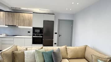 Apartamento Confort, balcón, vistas a la ciudad | Zona de estar