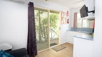 Riverside: 2 Bedroom Ensuite Cabin | Private kitchen | Fridge, microwave, stovetop, toaster