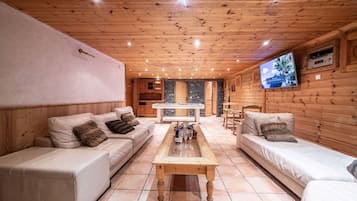 Smart TV, fireplace, table tennis, books