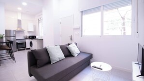 Living area - Viveros 2 by Concept Flats (Valencia)
