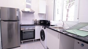 Private kitchen - Viveros 2 by Concept Flats (Valencia)