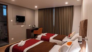 Deluxe Twin Room, 2 Single Beds | Desk, laptop workspace, free WiFi