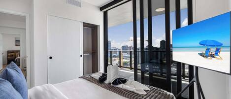 2 dormitorios, tabla de planchar con plancha, cuna de viaje y wifi