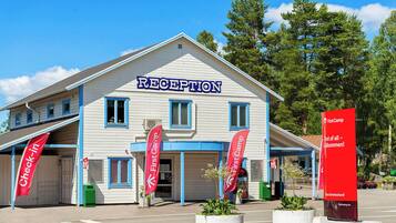 A reception building with a sign that reads "RECEPTION".
