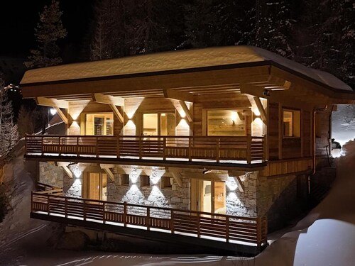 Chalet neuf à La Plagne avec parking et sauna