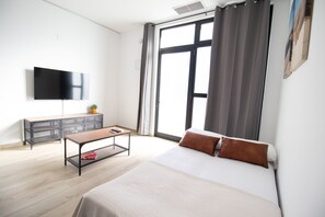 Tabla de planchar con plancha, wifi gratis, ropa de cama