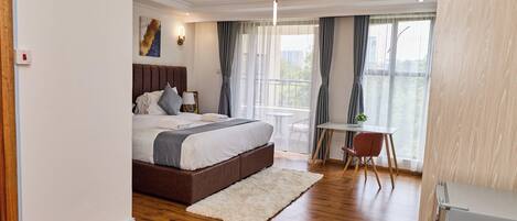 Espace de travail pour ordinateurs portables, fer et planche Ă repasser