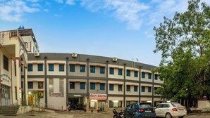 A multi-story building with a restaurant on the ground floor. - Devdarshan Hotel And Restaurant (Udaipur)