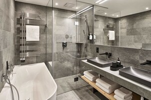 Separate tub and shower, hair dryer, towels, soap