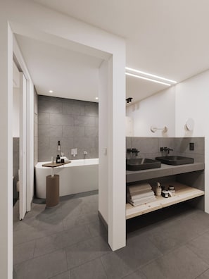 Separate bathtub and shower, hair dryer, towels, soap