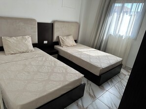 2 dormitorios, tabla de planchar con plancha, wifi y ropa de cama