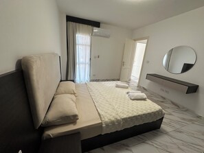 2 dormitorios, tabla de planchar con plancha, wifi y ropa de cama