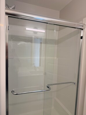 Shower, towels, soap, toilet paper