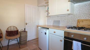 Fridge, microwave, toaster, cookware/dishes/utensils