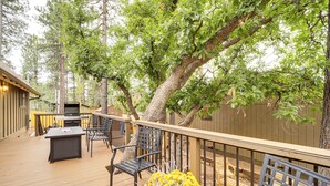 A wooden deck with outdoor furniture, a grill, and a potted plant. - Munds Park Oasis w/ Hiking Access & Fire Pit (Munds Park)