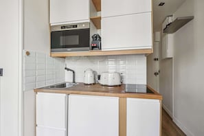 Fridge, microwave, coffee/tea maker, toaster