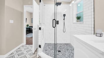 Shower, hair dryer, towels, soap