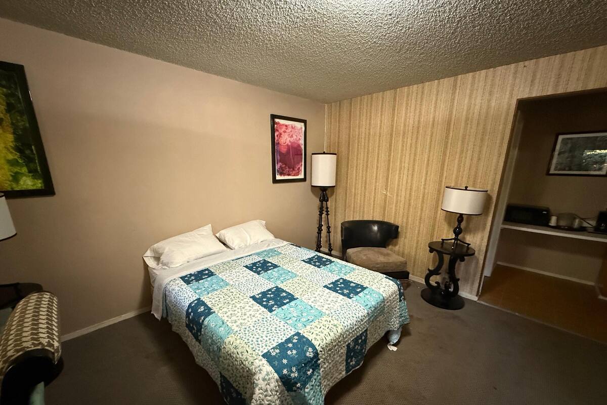 Room (1 King Bed & 1 Queen Bed) | Desk, iron/ironing board, free WiFi, bed sheets