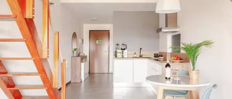 Fridge, microwave, stovetop, coffee/tea maker