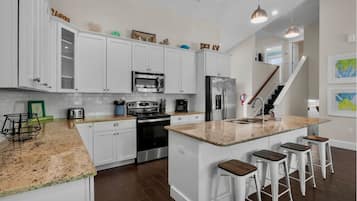 Townhome, 4 Bedrooms | Private kitchen | Fridge, oven, coffee/tea maker, toaster