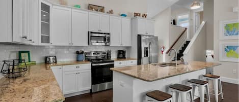 Townhome, 4 Bedrooms | Private kitchen | Fridge, oven, coffee/tea maker, toaster