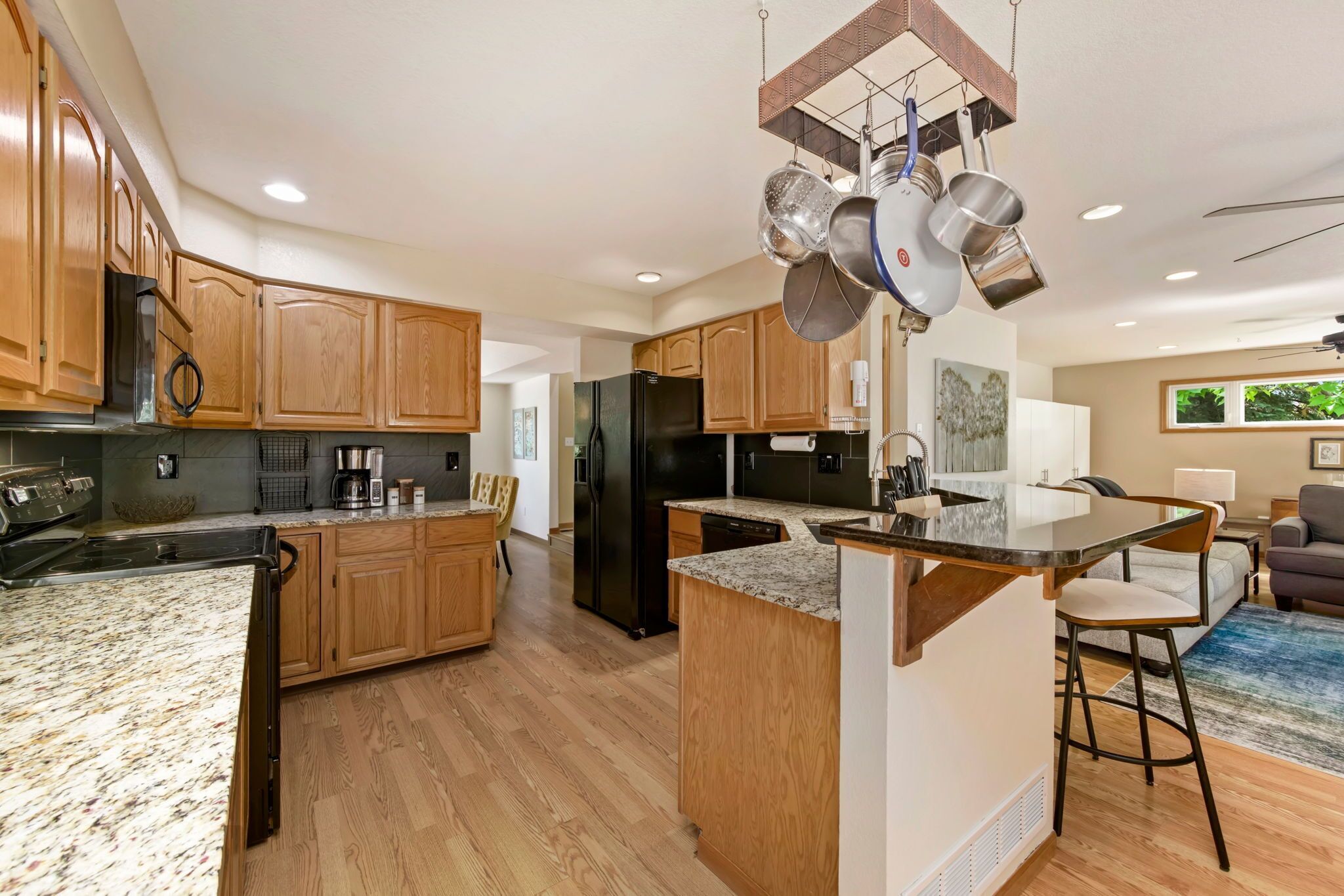 House, Multiple Beds, Patio, Garden View (2765 27th CT SW) | Private kitchen | Fridge, microwave, oven, stovetop