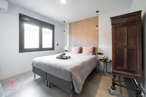 2 slaapkamers, een strijkplank/strijkijzer, gratis wifi, beddengoed