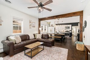 House, Multiple Beds, Patio, Garden View (205 Locust Street) | Living area | 55-inch flat-screen TV with digital channels, fireplace - Windsor Farmhouse Family Fun, Yard & Fireplace (Windsor)