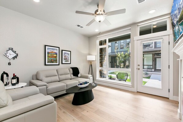 Condo, 1 King Bed, Patio, Garden View (856 Birdwhistle Lane #2) | Living area | 55-inch flat-screen TV with digital channels