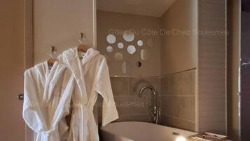Shower, free toiletries, hair dryer, bathrobes