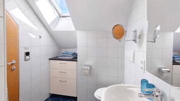 Shower, free toiletries, hair dryer, towels