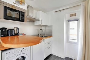 Apartment | Private kitchen | Fridge, stovetop, coffee/tea maker, electric kettle
