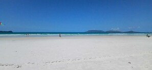 On the beach, white sand